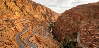 Driving in Morocco & Road Trip Guide: Car Rental, Rules & Police Checks Winding switchback mountain road through Dades Gorge canyon in Morocco