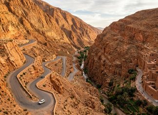 Driving in Morocco & Road Trip Guide: Car Rental, Rules & Police Checks Winding switchback mountain road through Dades Gorge canyon in Morocco