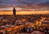 How Many Days in Marrakech? Realistic 2, 3, and 4-Day Itineraries & Season Guide Sunset panoramic view over Marrakech rooftops with illuminated Koutoubia Mosque