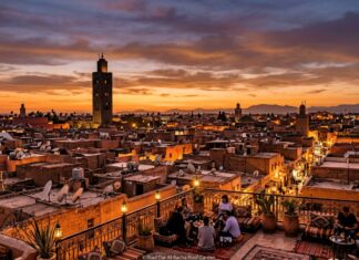 How Many Days in Marrakech? Realistic 2, 3, and 4-Day Itineraries & Season Guide Sunset panoramic view over Marrakech rooftops with illuminated Koutoubia Mosque