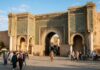 Morocco Train Travel Guide: ONCF, Al Boraq High-Speed & Tickets Monumental 18th-century ceremonial gateway of Bab El-Mansour in Meknes Morocco with Roman marble columns