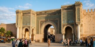 Morocco Train Travel Guide: ONCF, Al Boraq High-Speed & Tickets Monumental 18th-century ceremonial gateway of Bab El-Mansour in Meknes Morocco with Roman marble columns