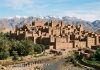 7 Days in Morocco: The Classic First-Timer Itinerary Ait Ben Haddou clay kasbah in Morocco with Atlas Mountains