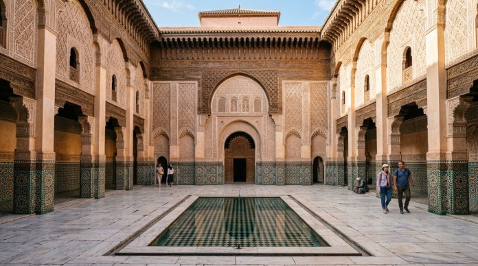 Things to Do in Marrakech - Ben Youssef Madrassa Courtyard Central courtyard and reflecting pool of Ben Youssef Madrassa in Marrakech Morocco