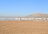 Agadir in Morocco: 12 Top Sights, Beaches, Hotels and Safety Tips Long sandy beach and hills on the coast at Agadir in Morocco