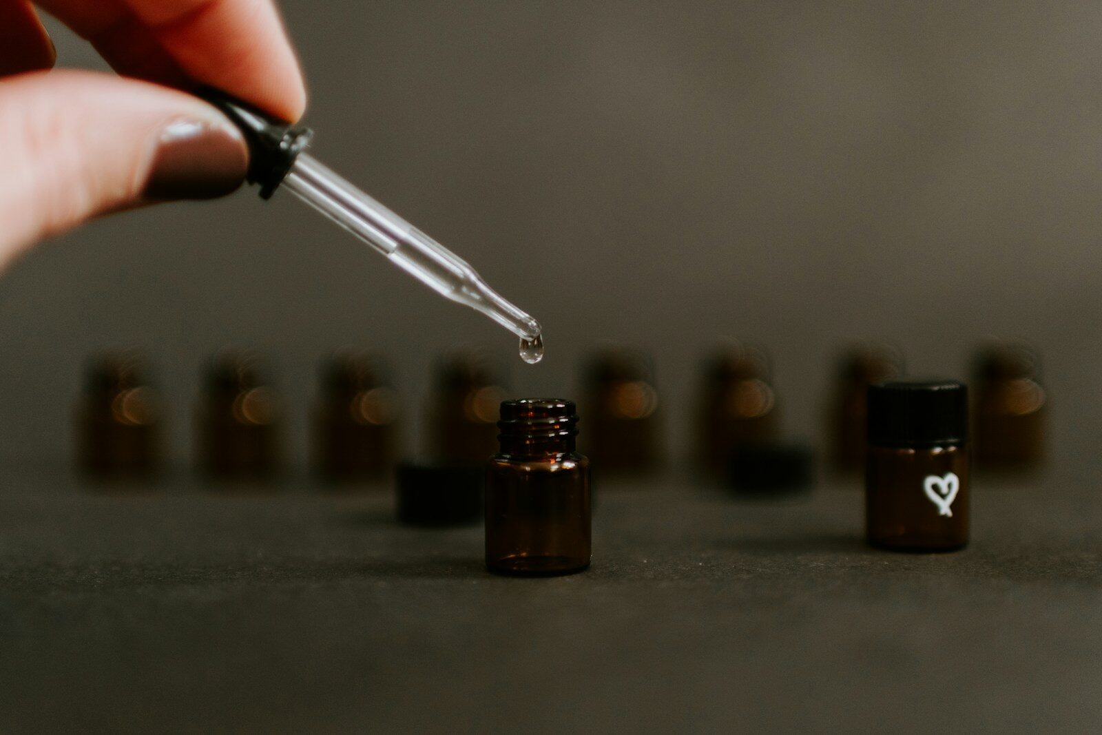 Amber glass dropper bottle, the right packaging for argan oil for skin