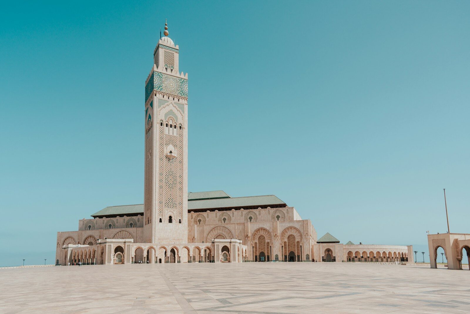 Casablanca Morocco travel guide: the Hassan II Mosque minaret rising behind the city
