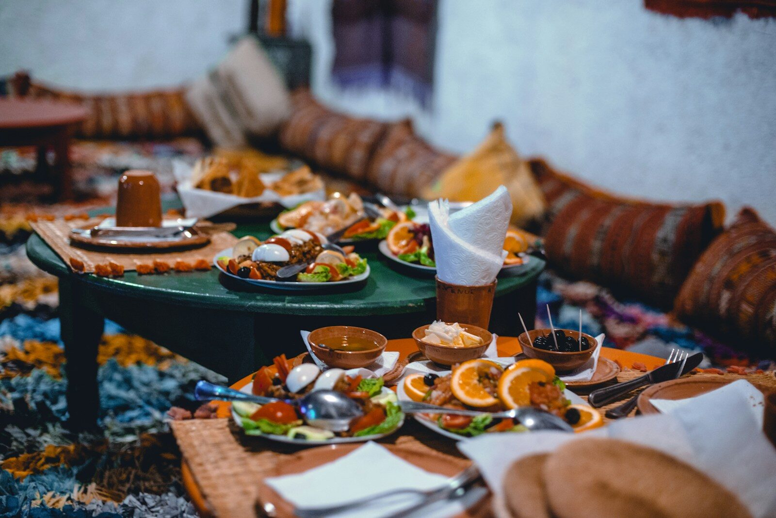 Table of Moroccan dishes like those served in Chefchaouen restaurants