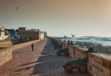 Essaouira Morocco Guide: 12 Best Things to Do, Hotels, Surf and Getting There Essaouira Morocco sea walls overlooking the Atlantic Ocean and the medina