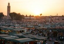 Moroccan Marrakech Guide: 10 Must-See Sights, Riads, Costs and Safety Jamaa Fna Marrakech square busy with visitors and stalls