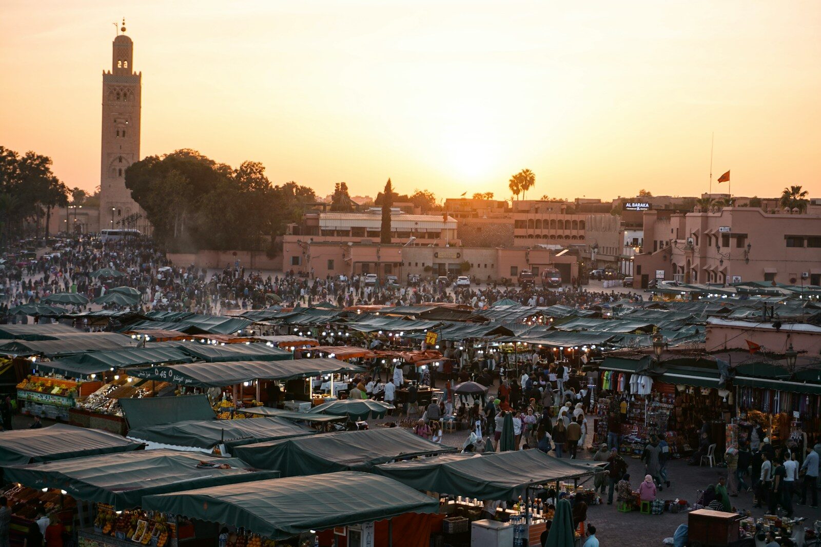 Jamaa Fna Marrakech square busy with visitors and stalls