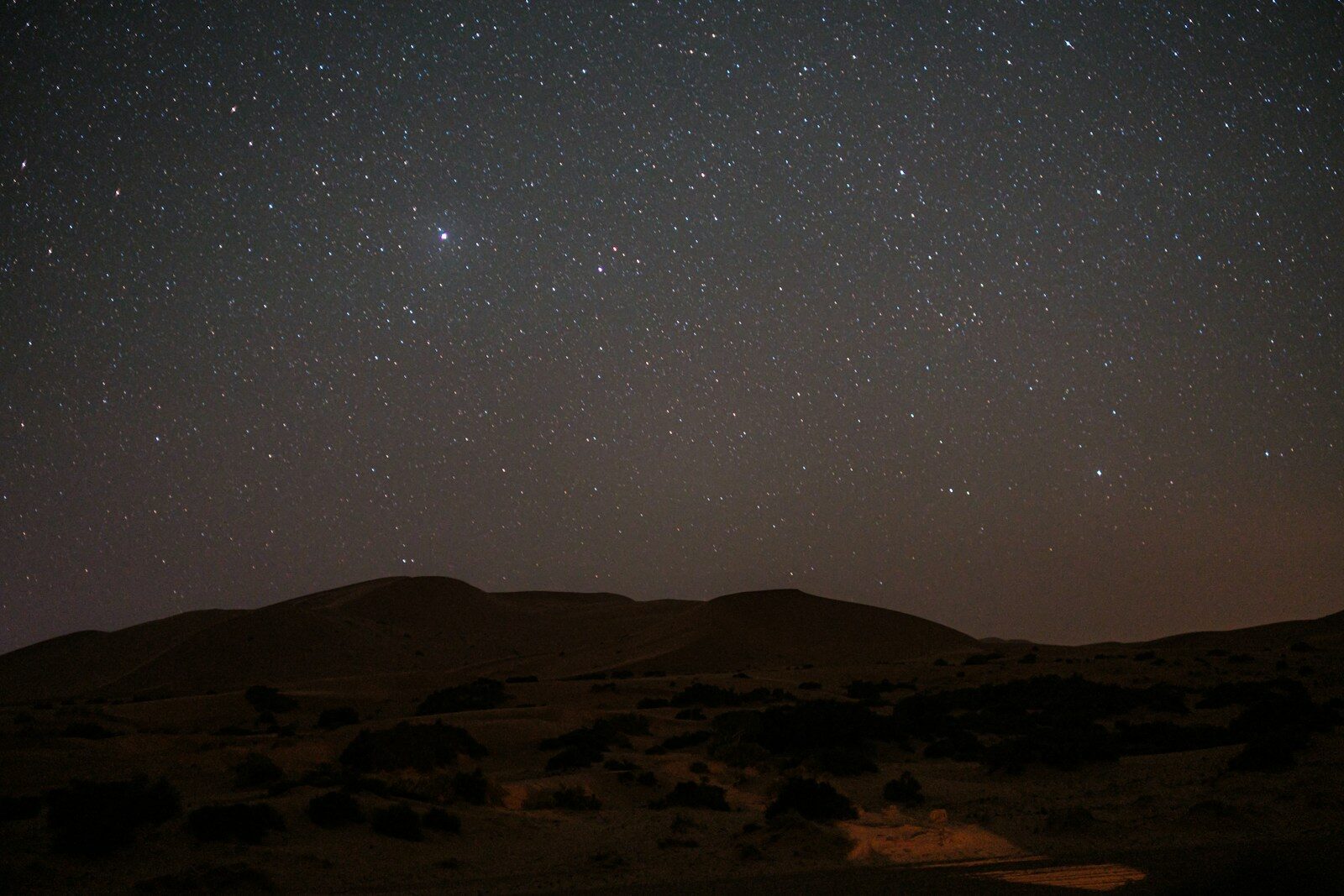 Starry night sky above the desert, a highlight of a Morocco Sahara desert tour