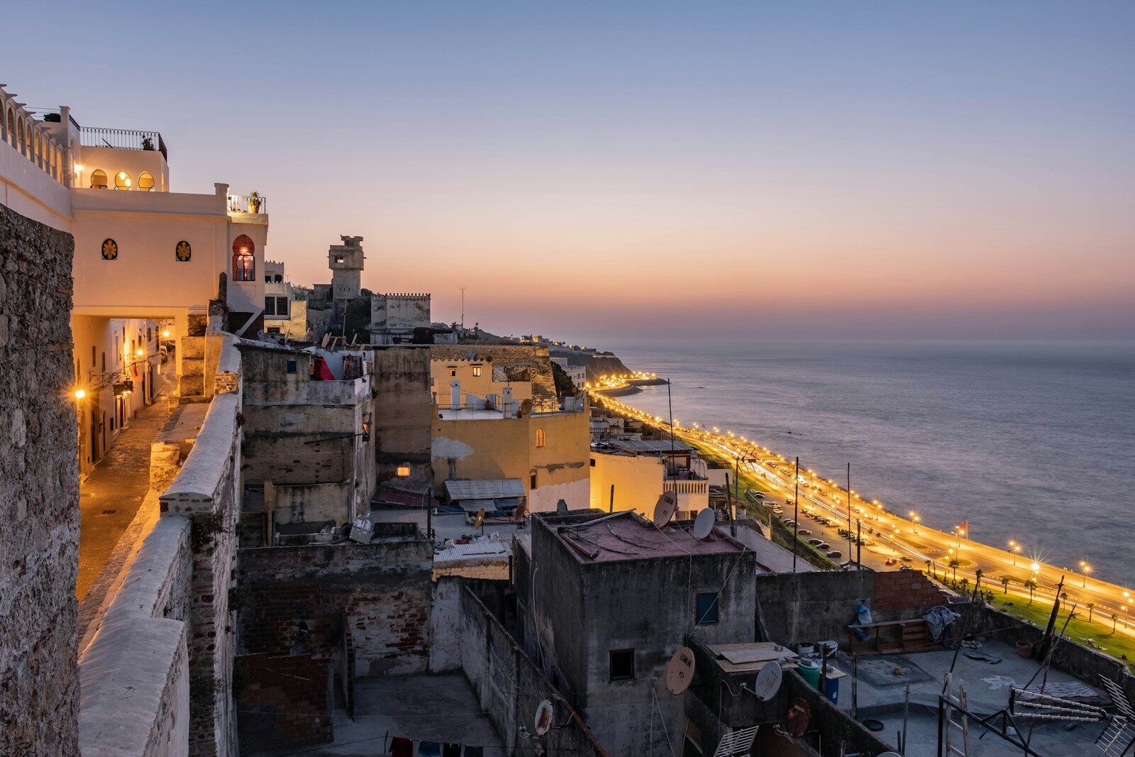 White Kasbah houses above the shore, among the top Tangier tourist attractions